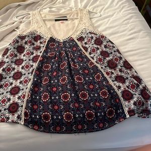 No boundary brand. Size medium. Blue and red tank top.